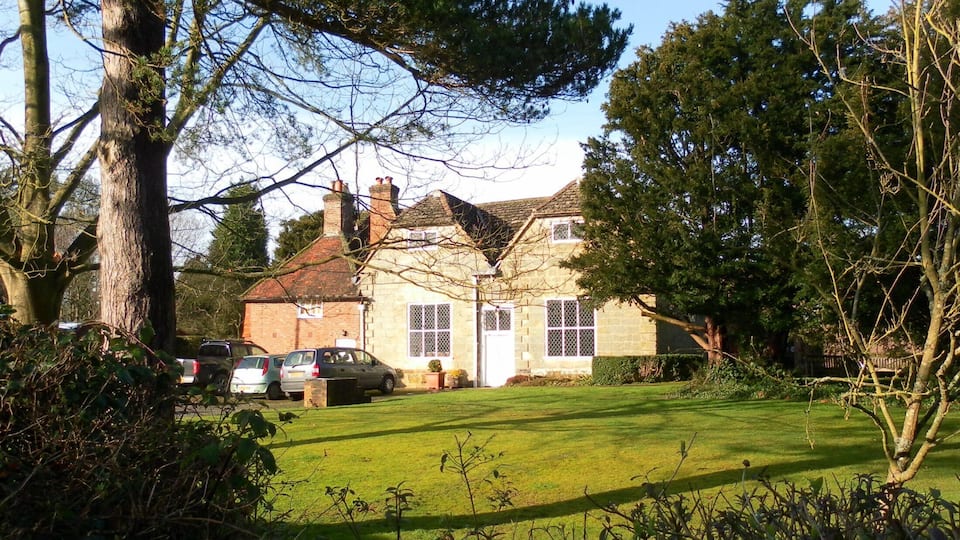 Friends' Meeting House (right) and Meeting House Cottage (left), Langley Lane, Ifield, Crawley, West Sussex, England. Built in 1676, this is one of the oldest Religious Society of Friends (Quaker) places of worship still in existence.