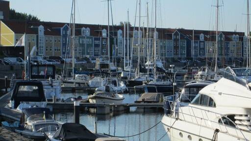 Colorfully painted homes by the docks.