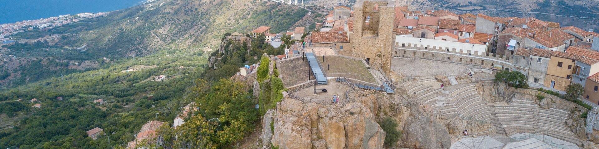 Aerial view over Pollina, beautiful town on top of the mountain in Sicily, Italy