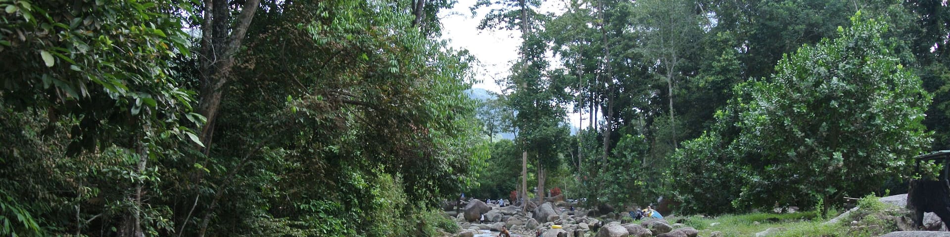 JERAM TOI, MALAYSIA -OCTOBER 22, 2020: Cozy atmosphere during the day at Jeram Toi Recreation Park in Malaysia. Visitors enjoy holidays and picnics with the family.