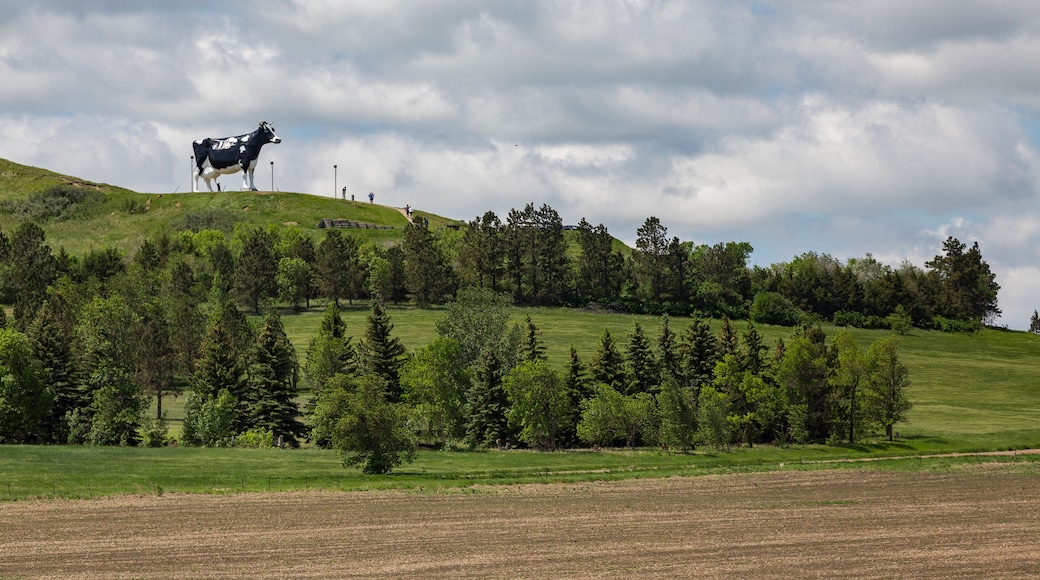 View of Salem Sue on hill against cloudy sky