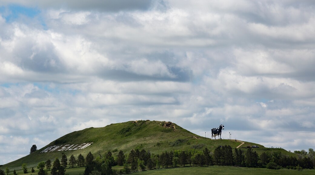 View of Salem Sue on hill against cloudy sky
