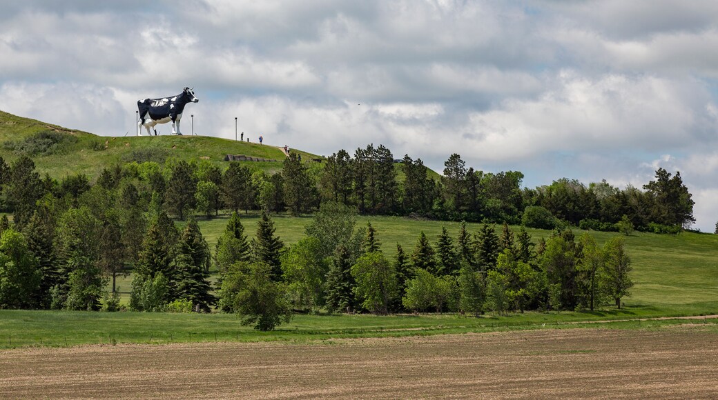 View of Salem Sue on hill against cloudy sky