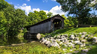 Fallasburg Covered Bridge. The historical Fallasburg covered bridge remains open to auto traffic and is located about 30 minutes from the city of Grand Rapids in Lowell Michigan.
