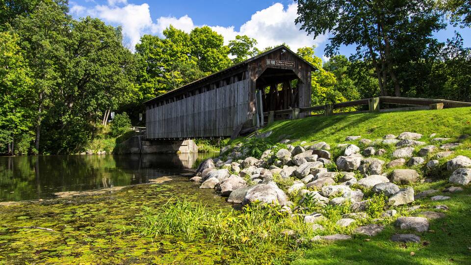 Fallasburg Covered Bridge. The historical Fallasburg covered bridge remains open to auto traffic and is located about 30 minutes from the city of Grand Rapids in Lowell Michigan.