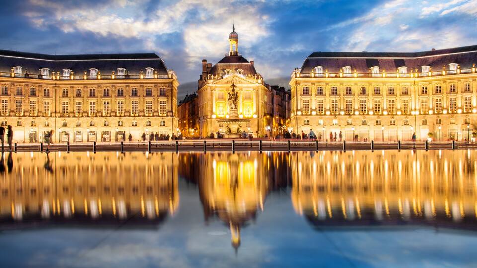 Place la Bourse in Bordeaux, the water mirror by night, France