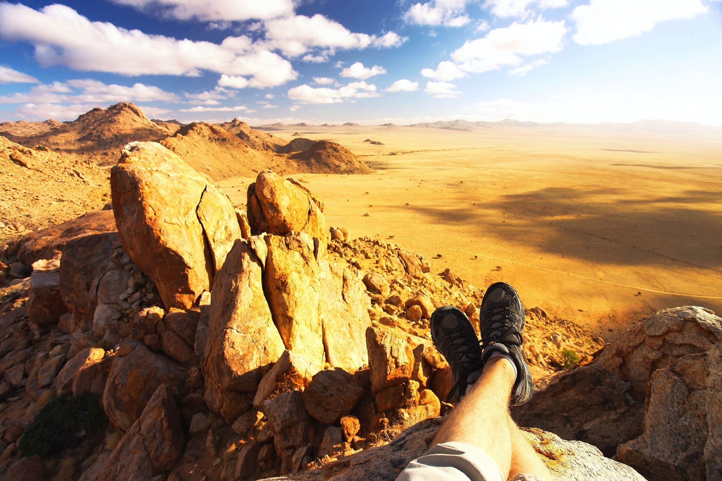 Me having a good time during #goldenhour in Namibia. If you happen to find yourself in this part of the world I can recommend staying at the Desert Horse Campsite. The #hiking trails in the area are fabulous and it's only a short distance from the coast. Watching the sun set from atop the large rock formations in the area is a must!