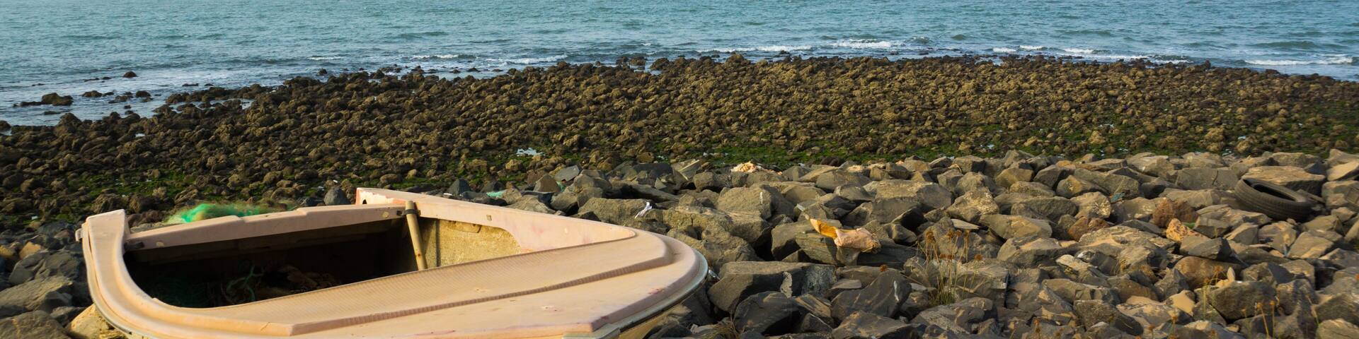 A boat on the shore of The Gambia, West Africa