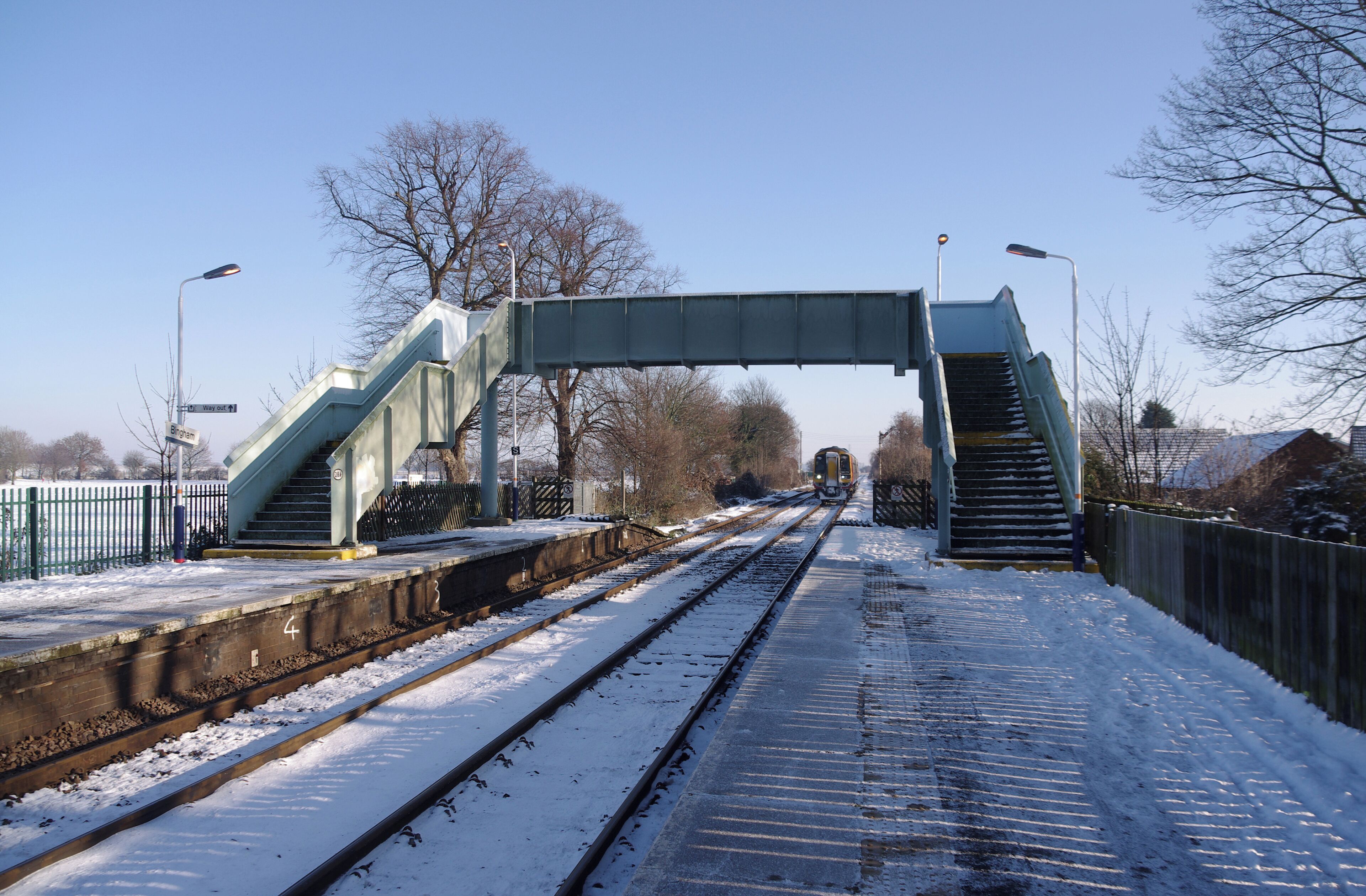East Midlands Trains "Express Sprinter" DMU 158774 arrives at Bingham railway station with a Skegness-Nottingham service.