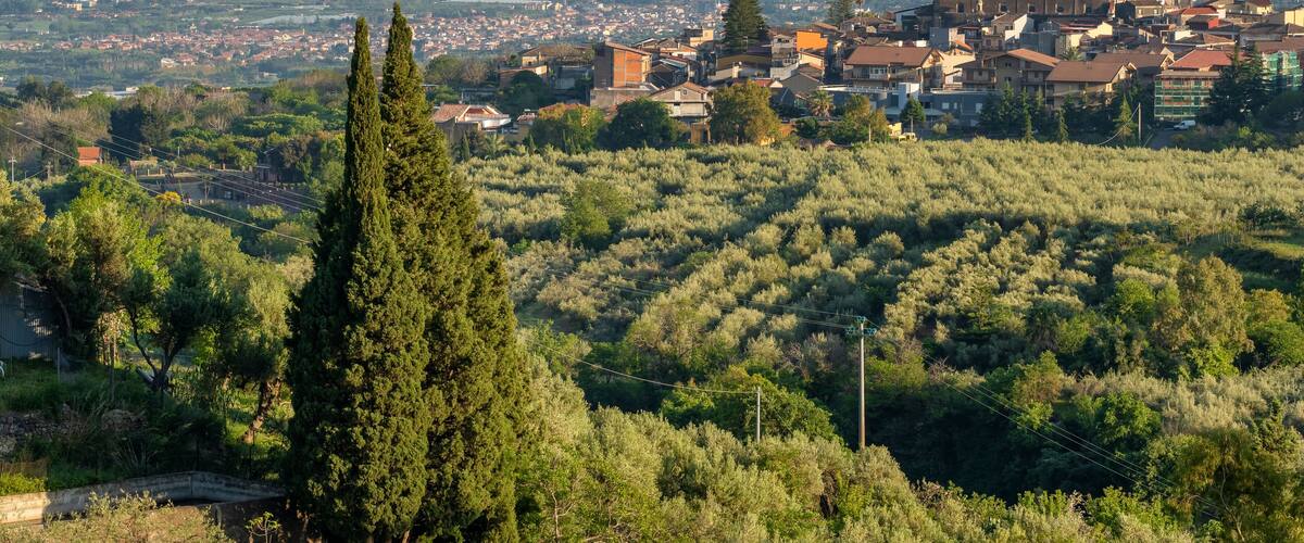 Beautiful sicilian landscape with Piedimonte Etneo town, Italy