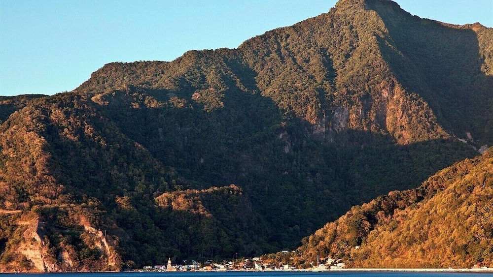 The tiny village of Soufrière, with Plat Pays Mountain rising in the background. With such steep, forested mountains covering most of the island, it's no surprise that Dominca has remained largely untamed.
Note: Photo taken from Scott's Head at sunset.