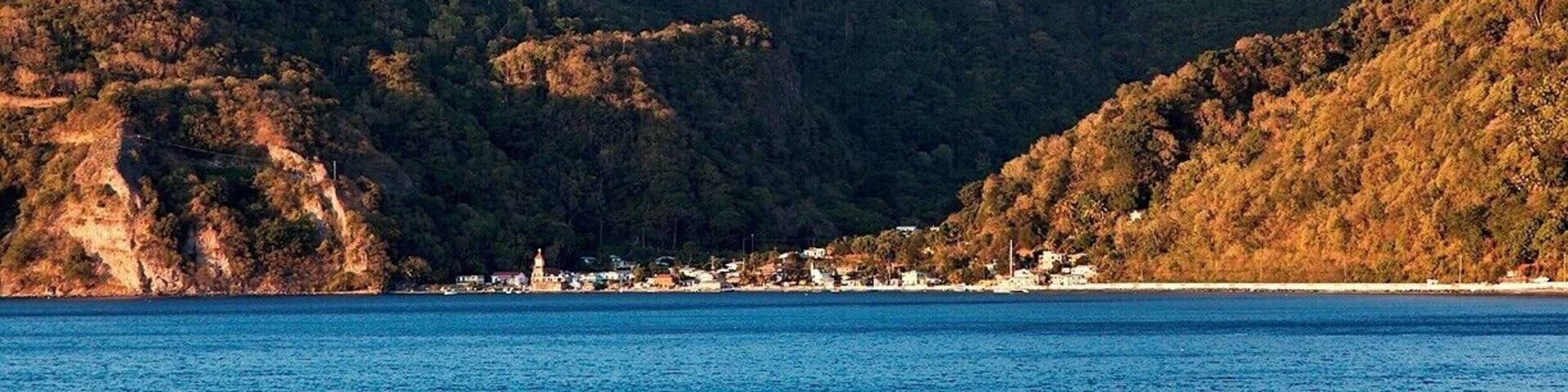 The tiny village of Soufrière, with Plat Pays Mountain rising in the background. With such steep, forested mountains covering most of the island, it's no surprise that Dominca has remained largely untamed.
Note: Photo taken from Scott's Head at sunset.