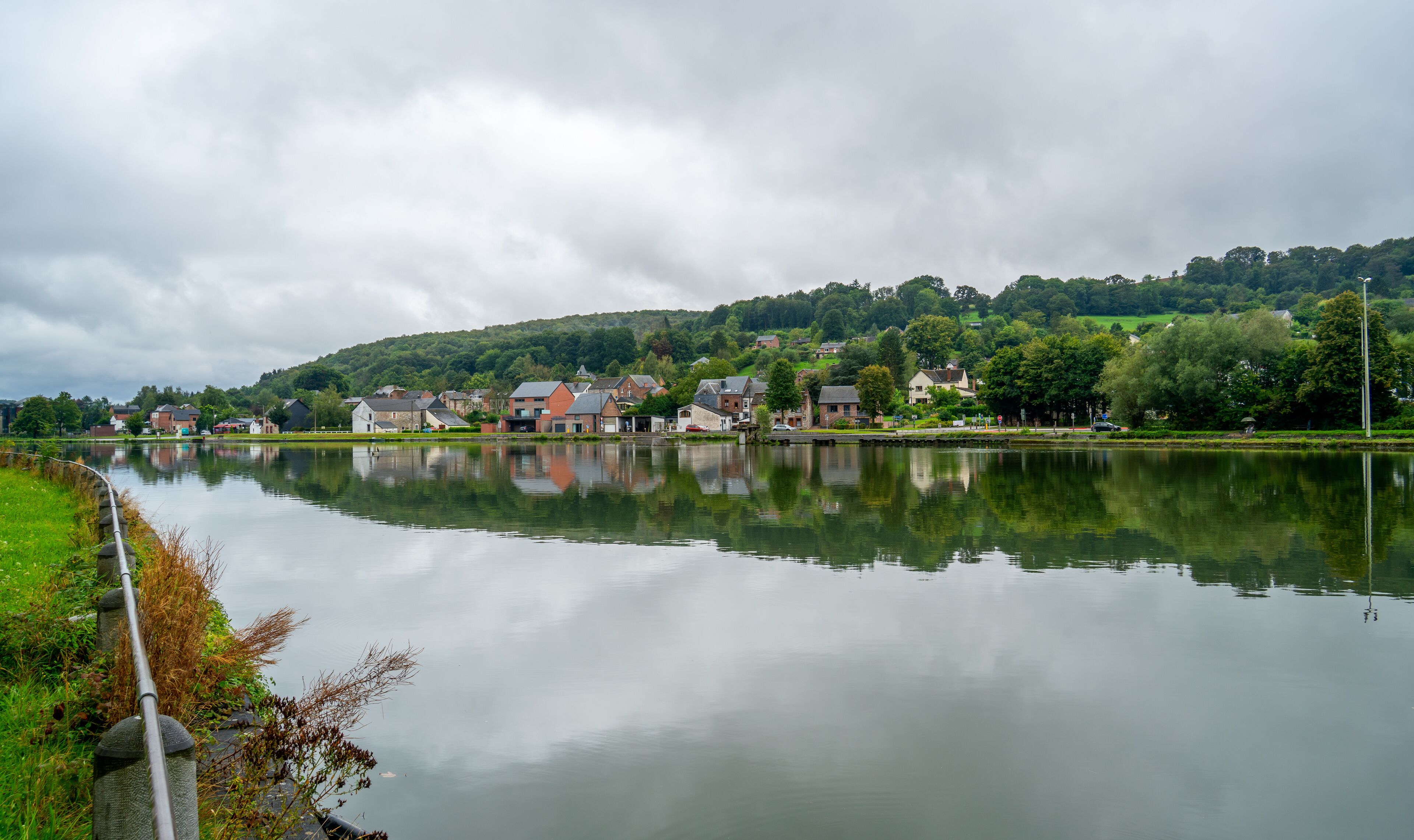 Scene with river Meuse and small village near Hastiere, Belgium
