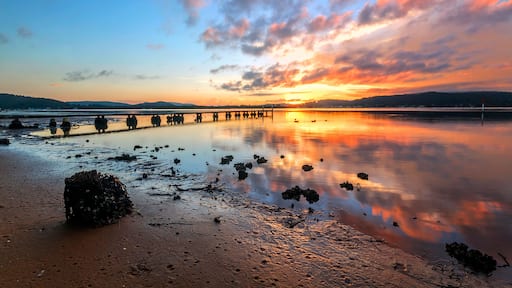 sunset over a body of water in woy woy on nsw central coast