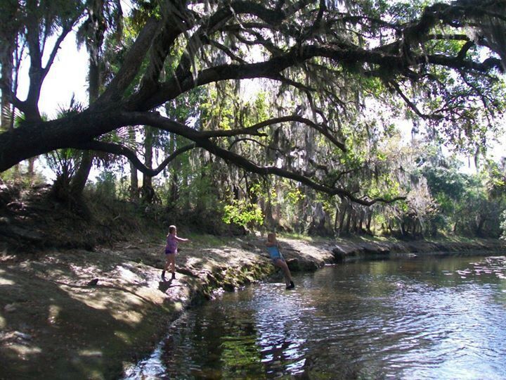 River rope swing at low water season. Paddle down the river, camp on it's banks and enjoy the scenery.