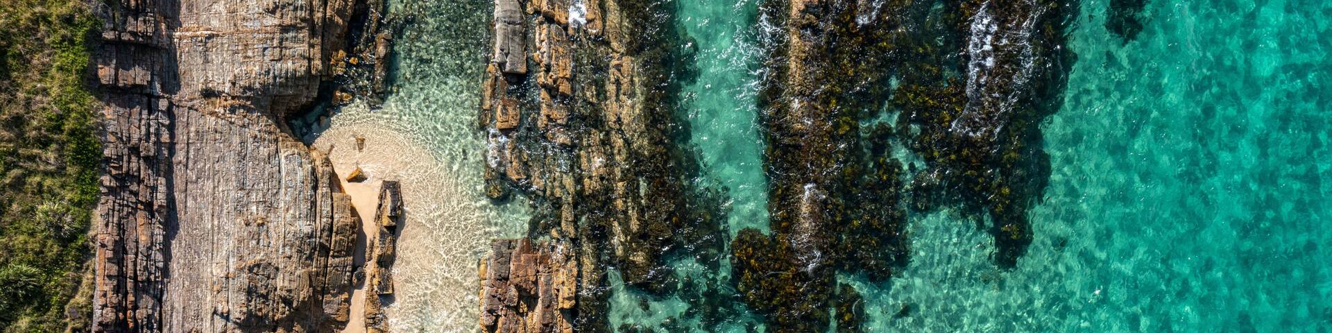Beautiful view of a beach with rocks on the Barrington coast in Australia