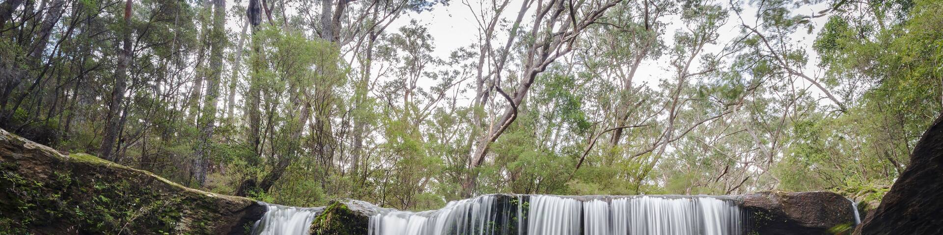 Beautiful streaming waterfall in the Morton National Park in Australia