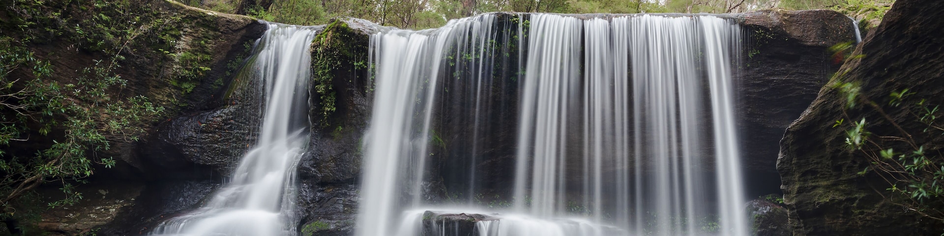 Beautiful streaming waterfall in the Morton National Park in Australia
