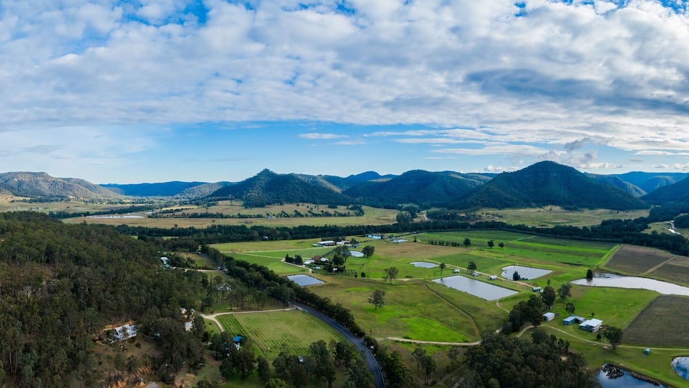 panoramic aerial landscape view of Wollombi brook and farmland properties in Broke