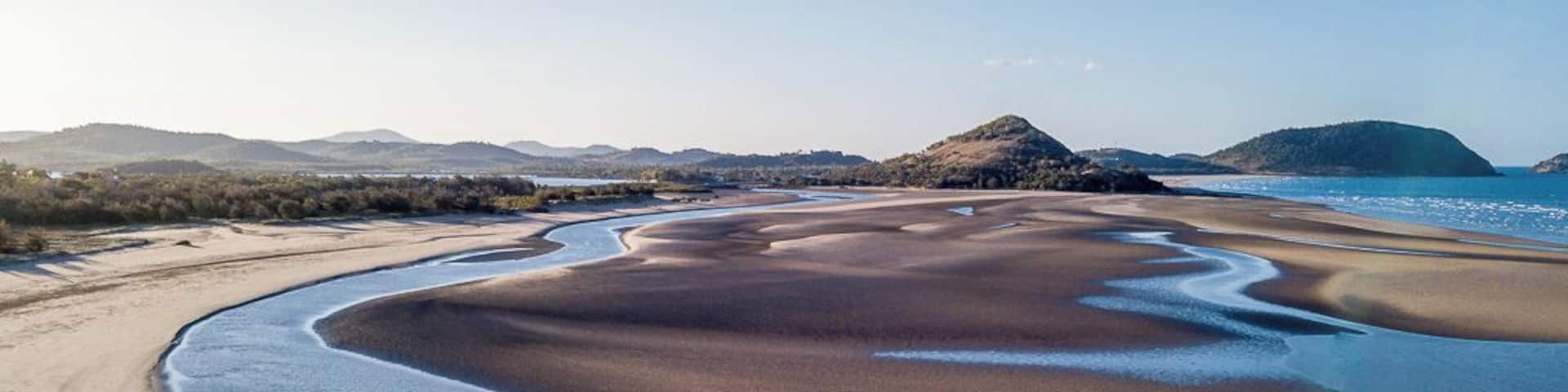 Kinka Beach on the Capricorn Coast of Queensland. the tide goes out here, a loong way. This image is taken from the South looking North towards Mulumbin Headland.