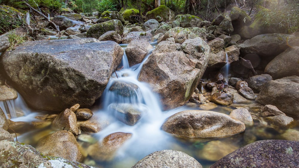 Water stream, waterfall, rocks landscape