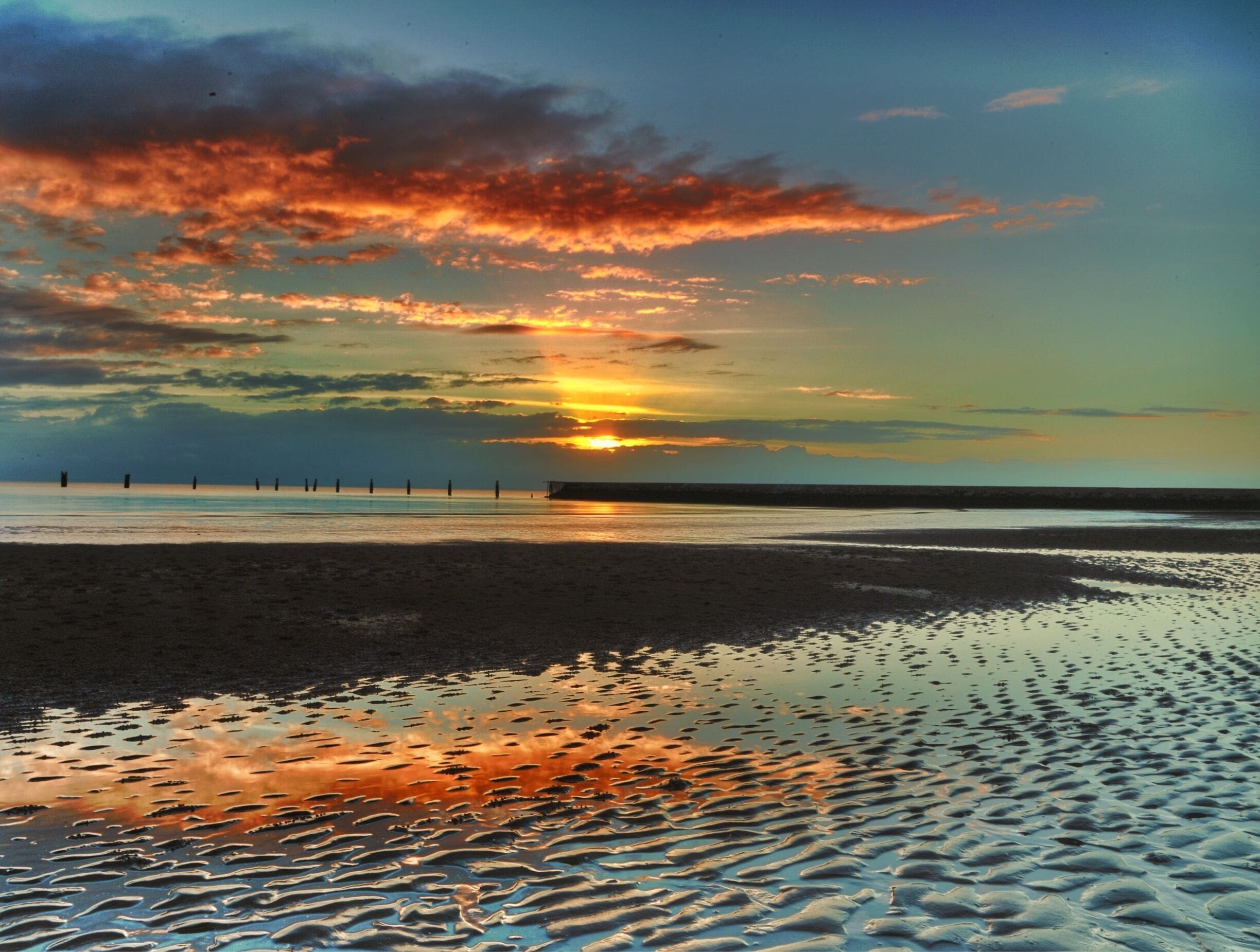 Sunrise at Shorncliffe jetty, or what's left of it.  The @brisbnecitycouncil are rebuilding the jetty so everyone can enjoy the area again.  A favourite place for locals and visitors to do just about anything.  Great parklands and child friendly.  Looking over to Moreton Island which is only a ferry ride away.  To see #goldenhour get to your destination about an hour earlier and wait for the right time.  It's worth it. 