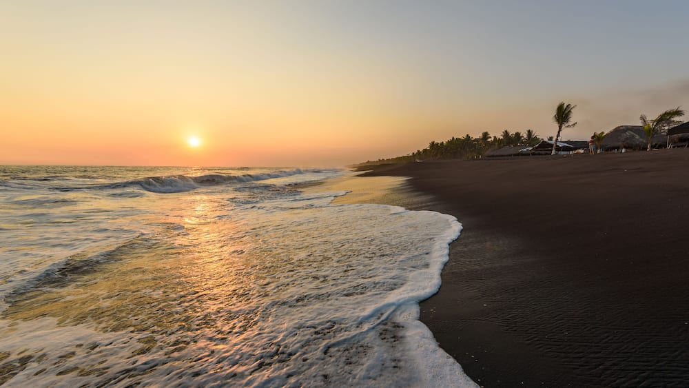 Sunset at Beach with Black Sand in Monterrico, Pacific coast of Guatemala.