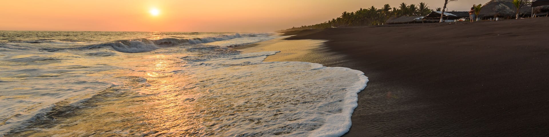 Sunset at Beach with Black Sand in Monterrico, Pacific coast of Guatemala.