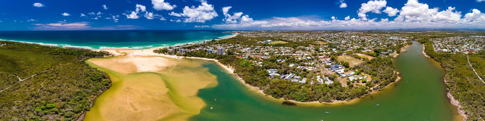Aerial drone view of beach at Currimundi Lake, Caloundra, Sunshine Coast, Queensland, Australia
