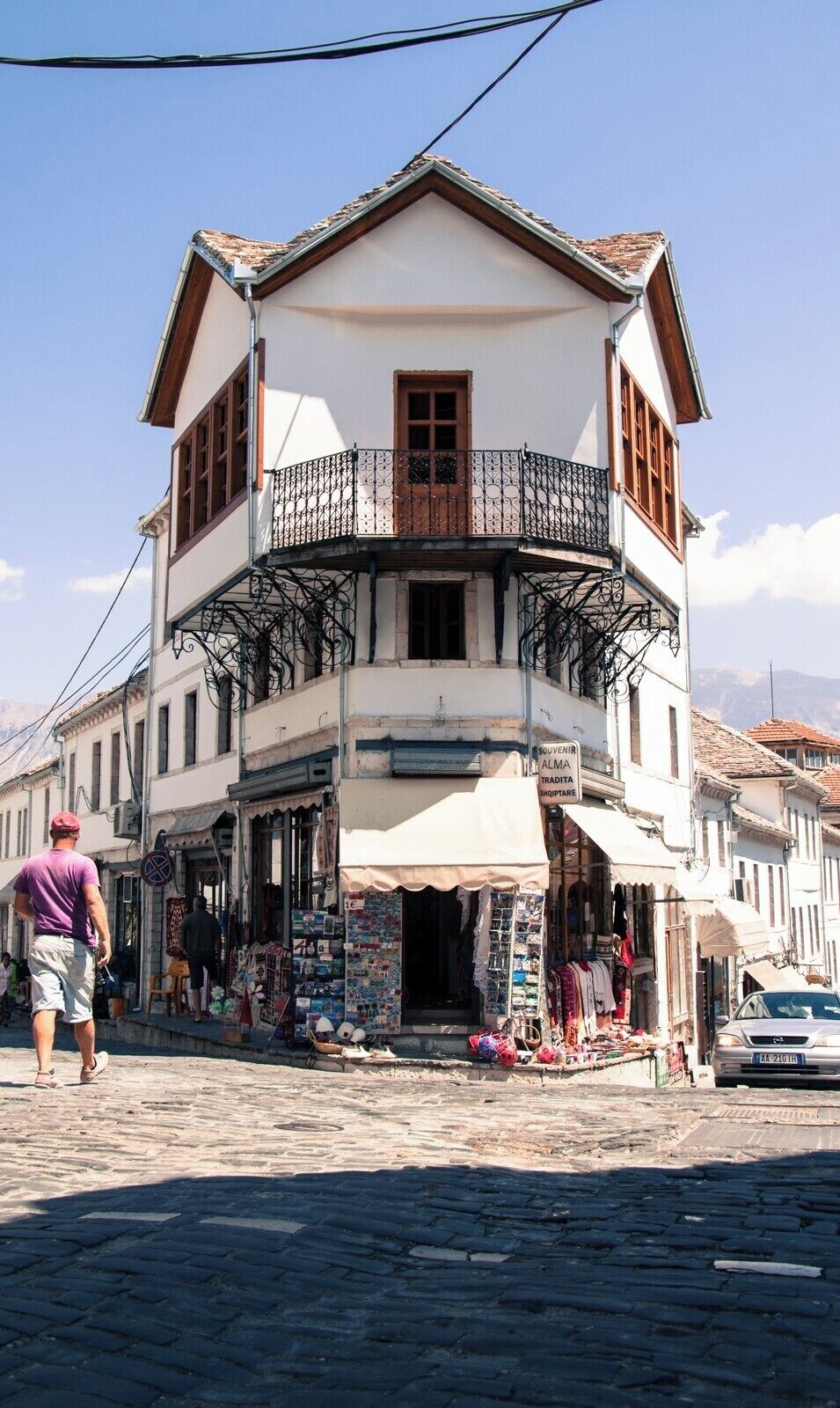 Gjirokastër (Albanian pronunciation: [ɟiɾokastəɾ]) is a city in southern Albania, on a valley between the Gjerë mountains and the Drino, at 300 metres above sea level. Its old town is a UNESCO World Heritage Site, described as "a rare example of a well-preserved Ottoman town, built by farmers of large estate". The city is overlooked by Gjirokastër Fortress, where the Gjirokastër National Folklore Festival is held every five years. It is the birthplace of former Albanian communist leader Enver Hoxha and notable writer Ismail Kadare. [from Wikipedia]
