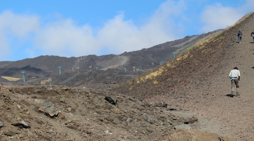 Walking to the summit of Mount Etna. I have a great interest in geology with particular interest in volcanoes. It was great to be up on this active volcano, you could feel the heat through the rocks.