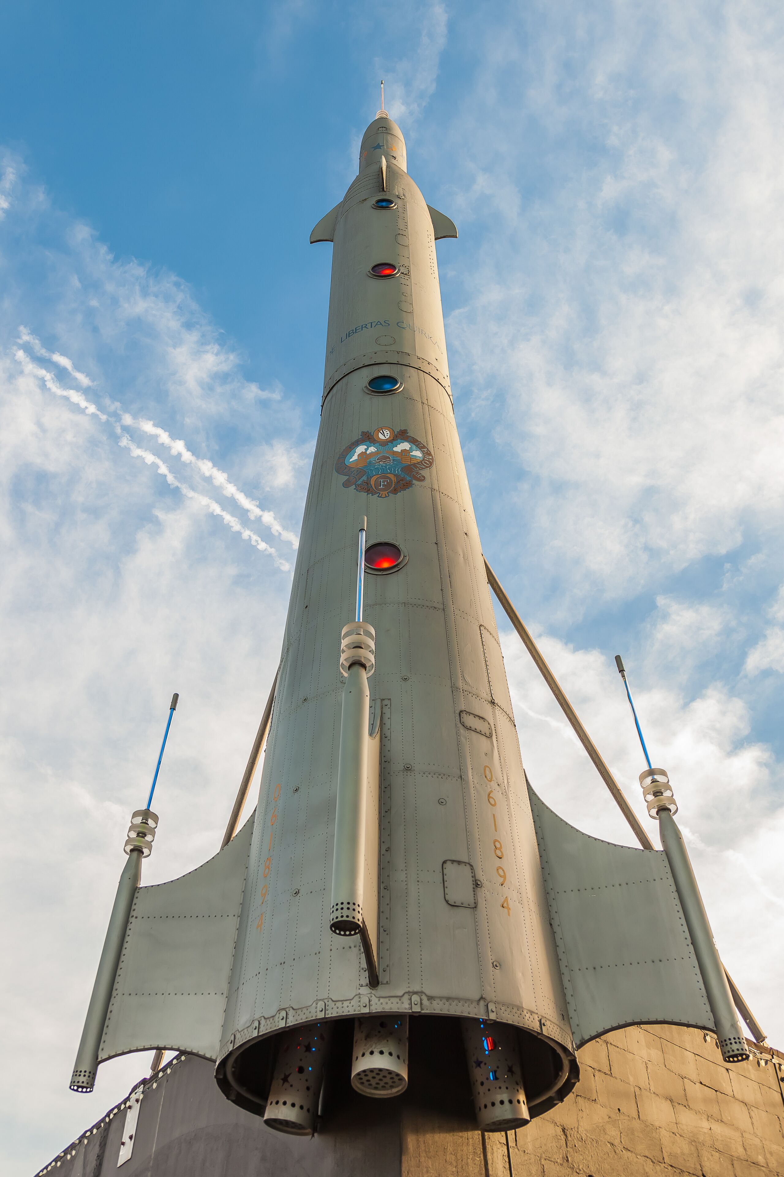 A space shuttle with a clear sky in the background.
