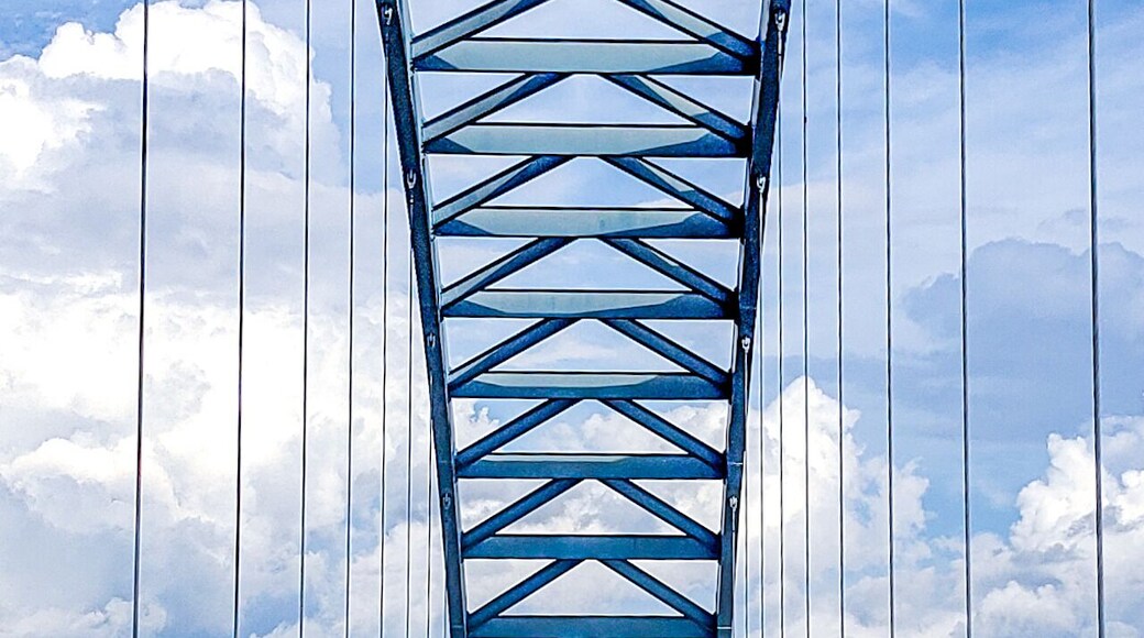 Stunning bridge in the middle of nowhere, surrounded by mountains, very scenic.