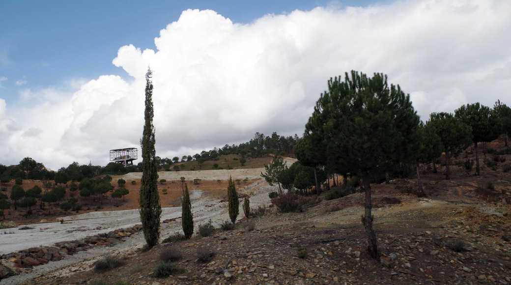 Landscape with mining winches in the road to the touristic mining train in Nerva. (Huelva, Spain)
