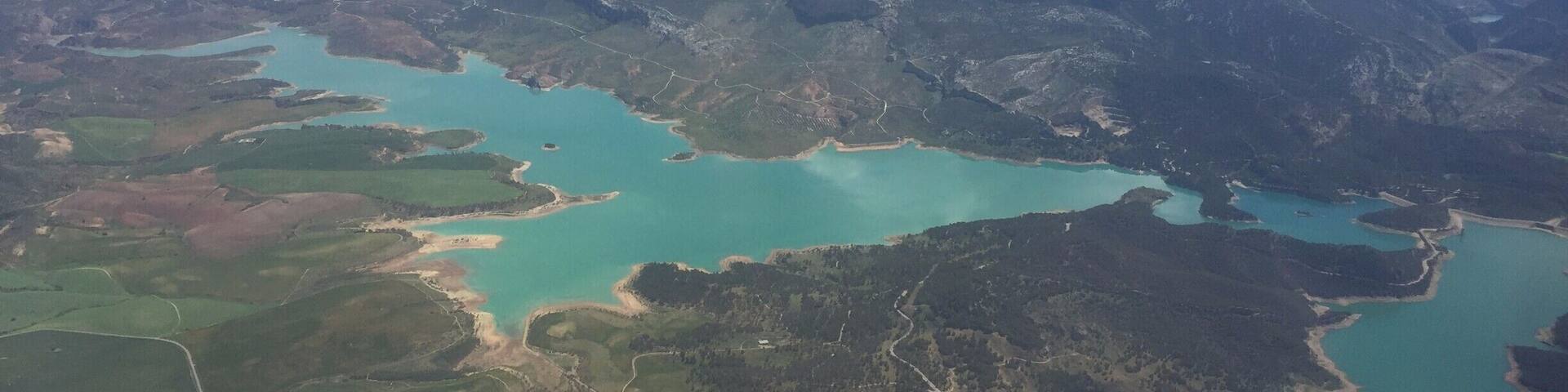 Looking over the view of Ardales near Malaga. This beautiful white-stoned village is popular summy get-away among local Andalucians but almost unheard of outside of Spain. #Merch #LifeAtExpedia