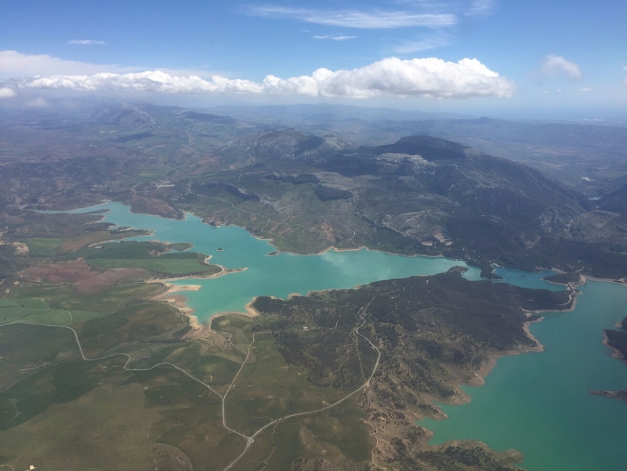 Looking over the view of Ardales near Malaga. This beautiful white-stoned village is popular summy get-away among local Andalucians but almost unheard of outside of Spain. #Merch #LifeAtExpedia