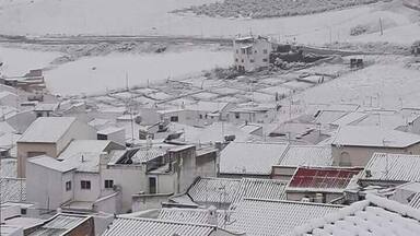 A very rare view of a snow bound Pruna. Rooftop pic of Castillo Hierro