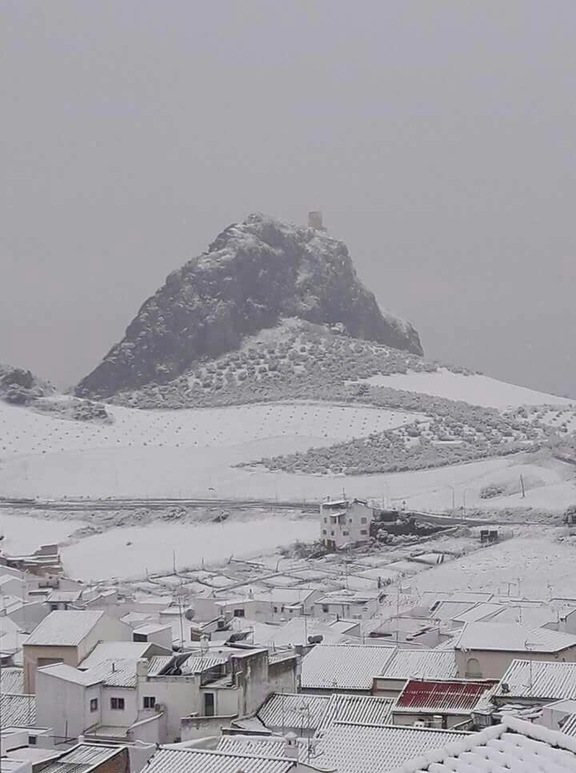 A very rare view of a snow bound Pruna. Rooftop pic of Castillo Hierro