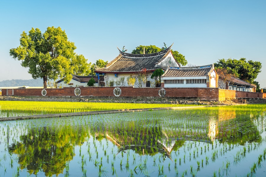 A traditional Taiwanese Mingnan architecture whit paddy field in Caotun, Nantou City., Shutterstock ID 1029224923, SF SSA Case with Manager Approval: Case 07151371, Job: Prepay credit, Client/Licensee