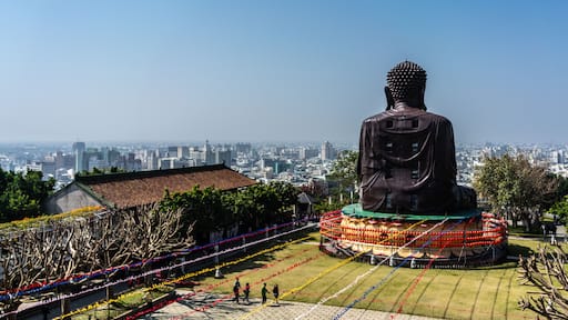 Baguashan great Buddha statue from mount Bagua and Changhua cityscape panorama in background in Taiwan