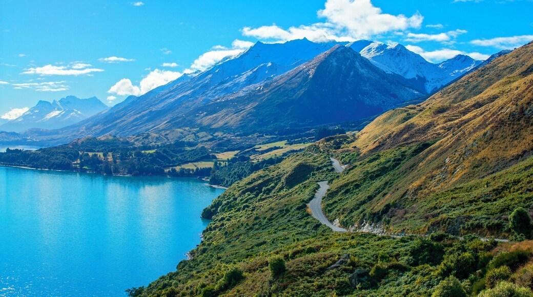The drive from Queenstown to Glenorchy is by far my most favourite drive I've ever done, and it's gonna be really hard to beat that.
We were so lucky to visit Queenstown and Glenorchy in the middle of winter (June 2013, minus or 0 during the day, as crisp as you'd want your perfect winter to be) and have this absolute clear day with cracking blue skies.
The windy roads lead you through stunning green valleys, contrasted by clear blue lakes, majestic mountains topped with a crisp blanket of snow.