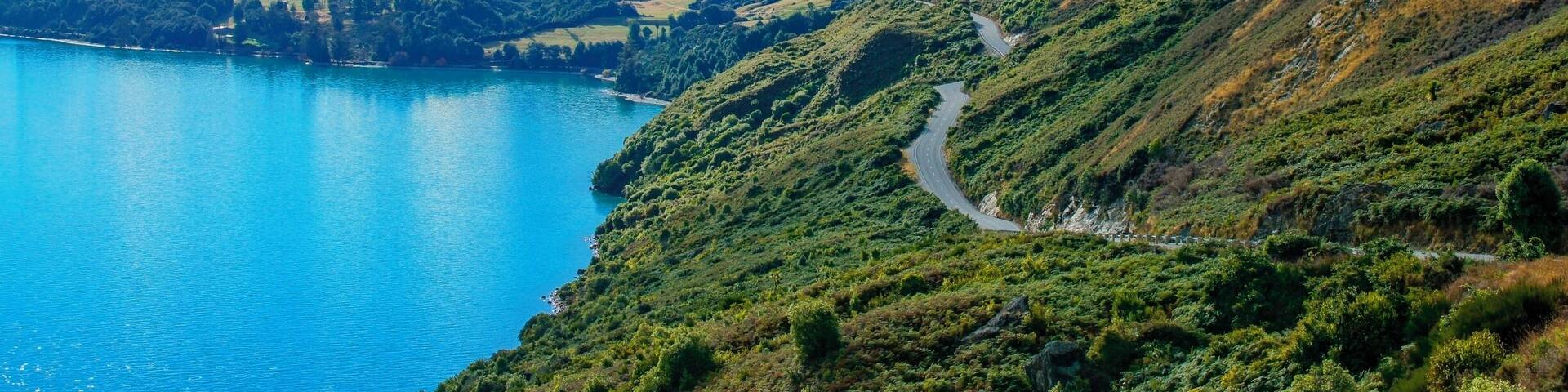 The drive from Queenstown to Glenorchy is by far my most favourite drive I've ever done, and it's gonna be really hard to beat that.
We were so lucky to visit Queenstown and Glenorchy in the middle of winter (June 2013, minus or 0 during the day, as crisp as you'd want your perfect winter to be) and have this absolute clear day with cracking blue skies.
The windy roads lead you through stunning green valleys, contrasted by clear blue lakes, majestic mountains topped with a crisp blanket of snow.