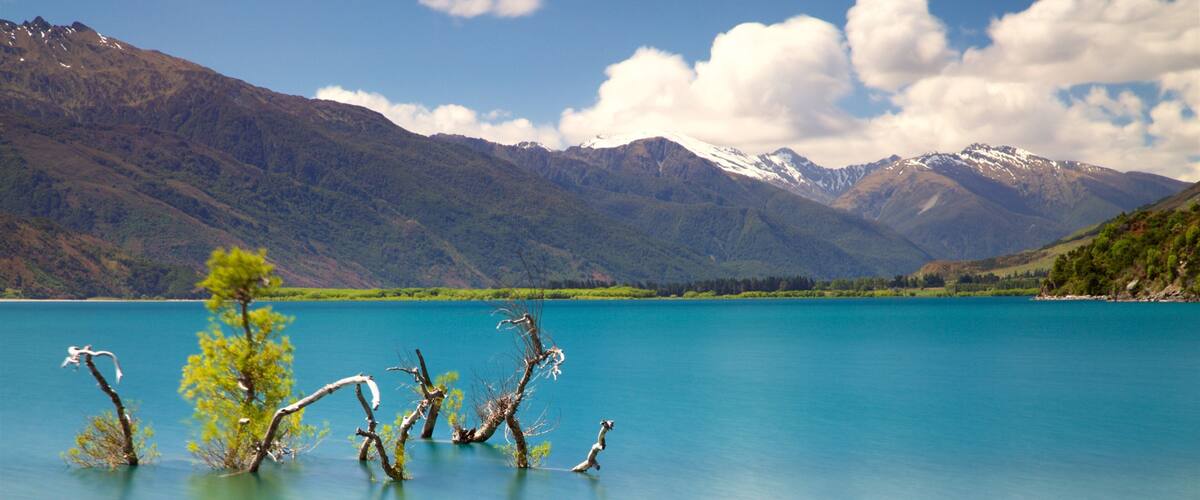 Wanaka featuring mountains and a lake or waterhole