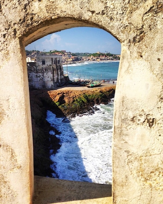 Cape Coast Castle is one of approximately forty fortresses built along the Gold Coast of West Africa by Europeans. Originally built by the Swedes for trading for timber and gold, the fort passed into the hands of the Dutch, followed by the British during which time the fort became infamously associated with the emergent slave trade. Today it serves as a stark reminder of that tragic period in history.