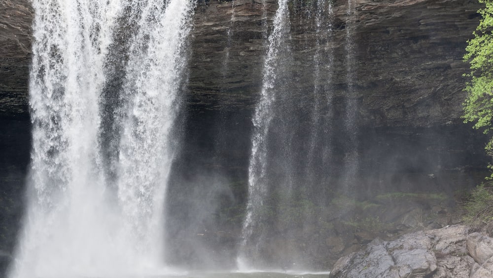 A waterfall cascading down a rocky cliff.
