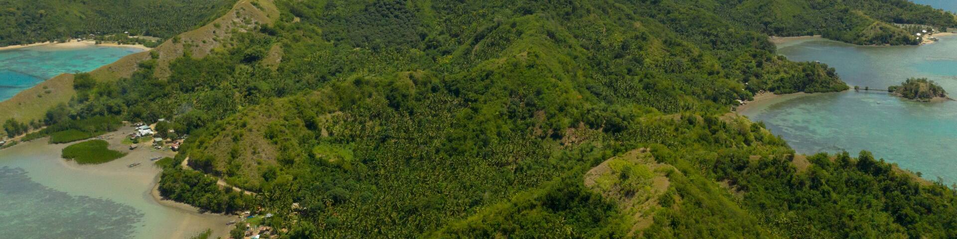 Aerial view of Sleeping dinosaur island of Mati Davao Oriental Philippines. One of the known tourist spot of that area. Philippines, Mindanao.
