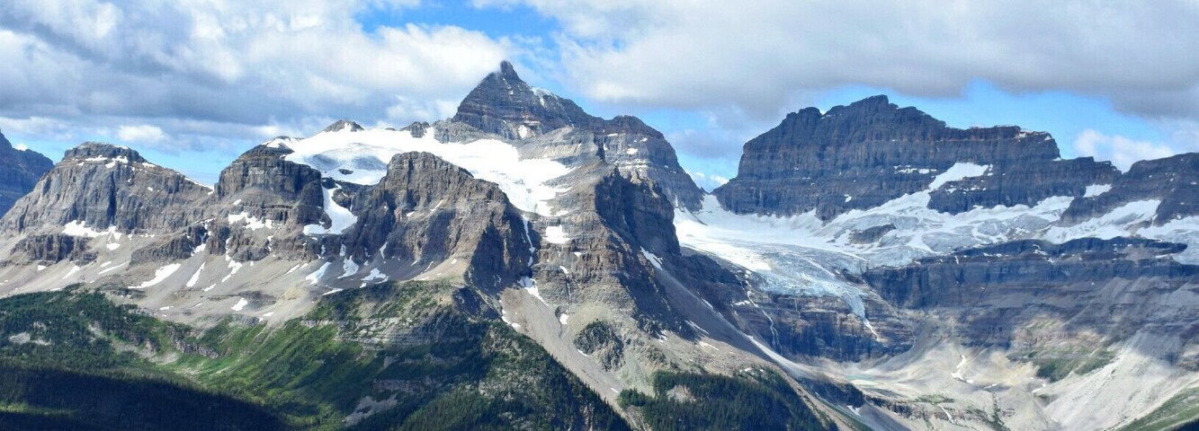 This is the tour that left me speechless. It was a tour over the Canadian Rockies with Alpine Helicopters based in Canmore, Alberta The view here is Gloria Lake and Marvel Lake, with Aye Mountain and its glacier as a backdrop. #blue
For more on the story and photos, see: http://www.travelblissnow.com/a-spectacular-helicopter-tour-over-the-canadian-rockies/