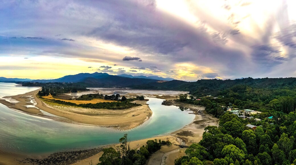 Ultra wide HDR Panorama of River estuary with mountains in the background