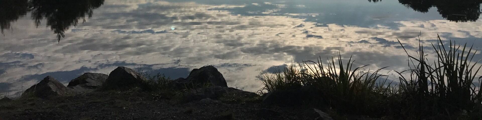 Lake at Chateau Chigy in the silent sunny early morning