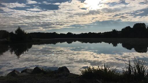 Lake at Chateau Chigy in the silent sunny early morning